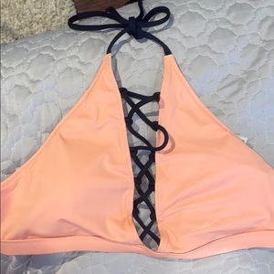 Peach colored halter top swimsuit